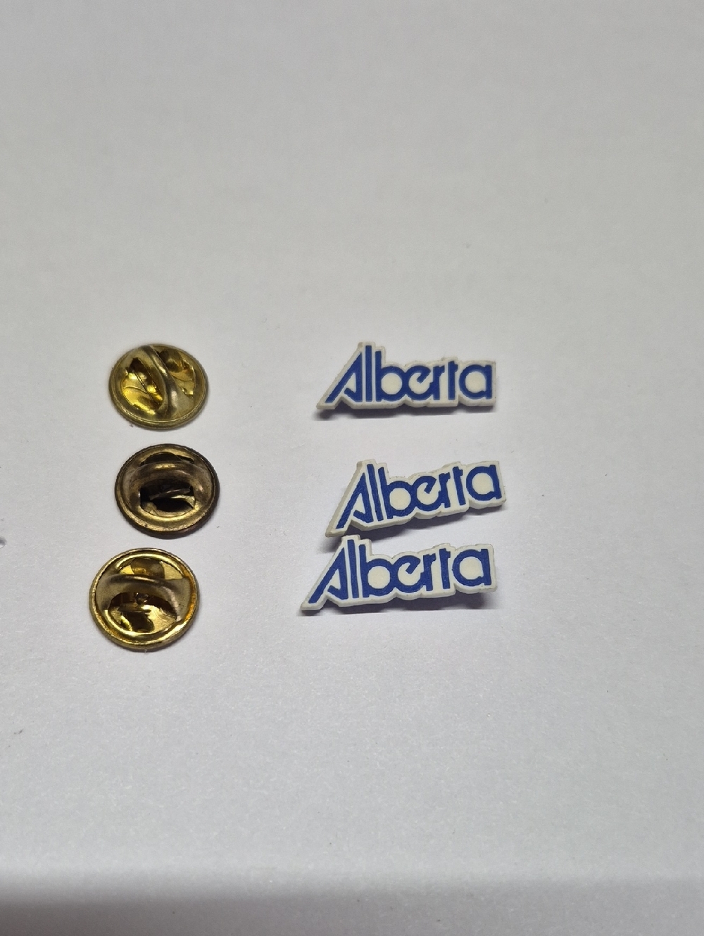 Source Unknown White and Blue Alberta Lapel Pin Set with Gold Backs